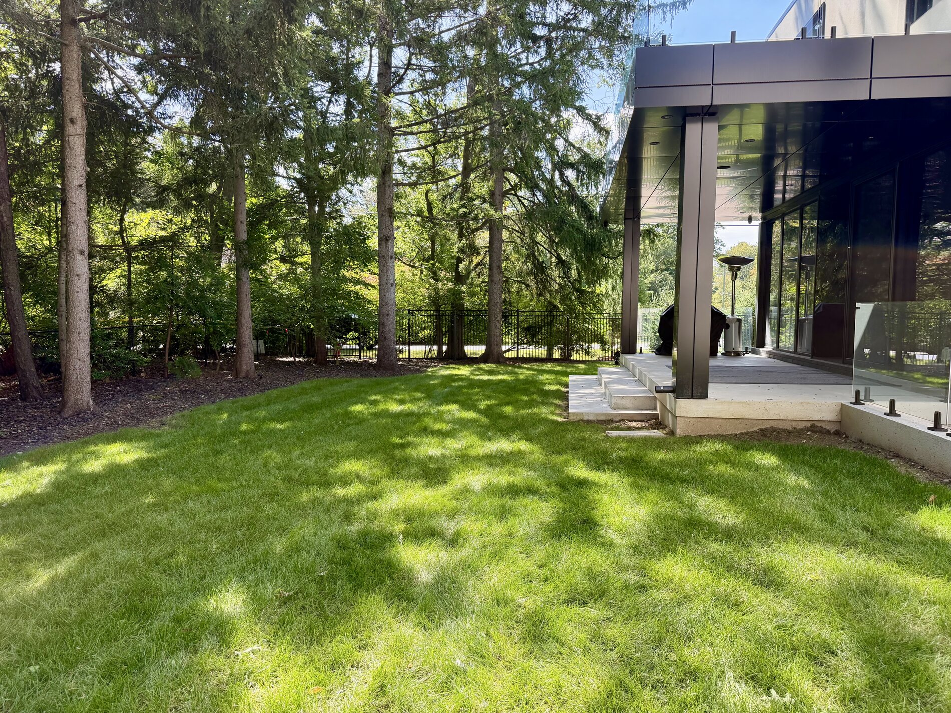 1654 Birchwood Drive — completed metal-fenced privacy yard