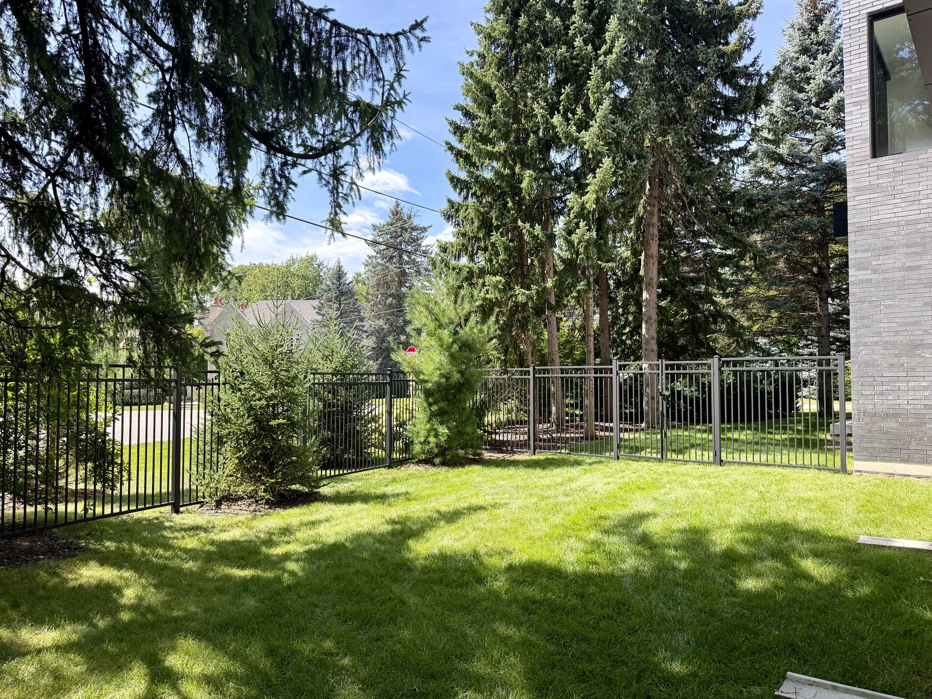 1654 Birchwood Drive — completed metal-fenced privacy yard