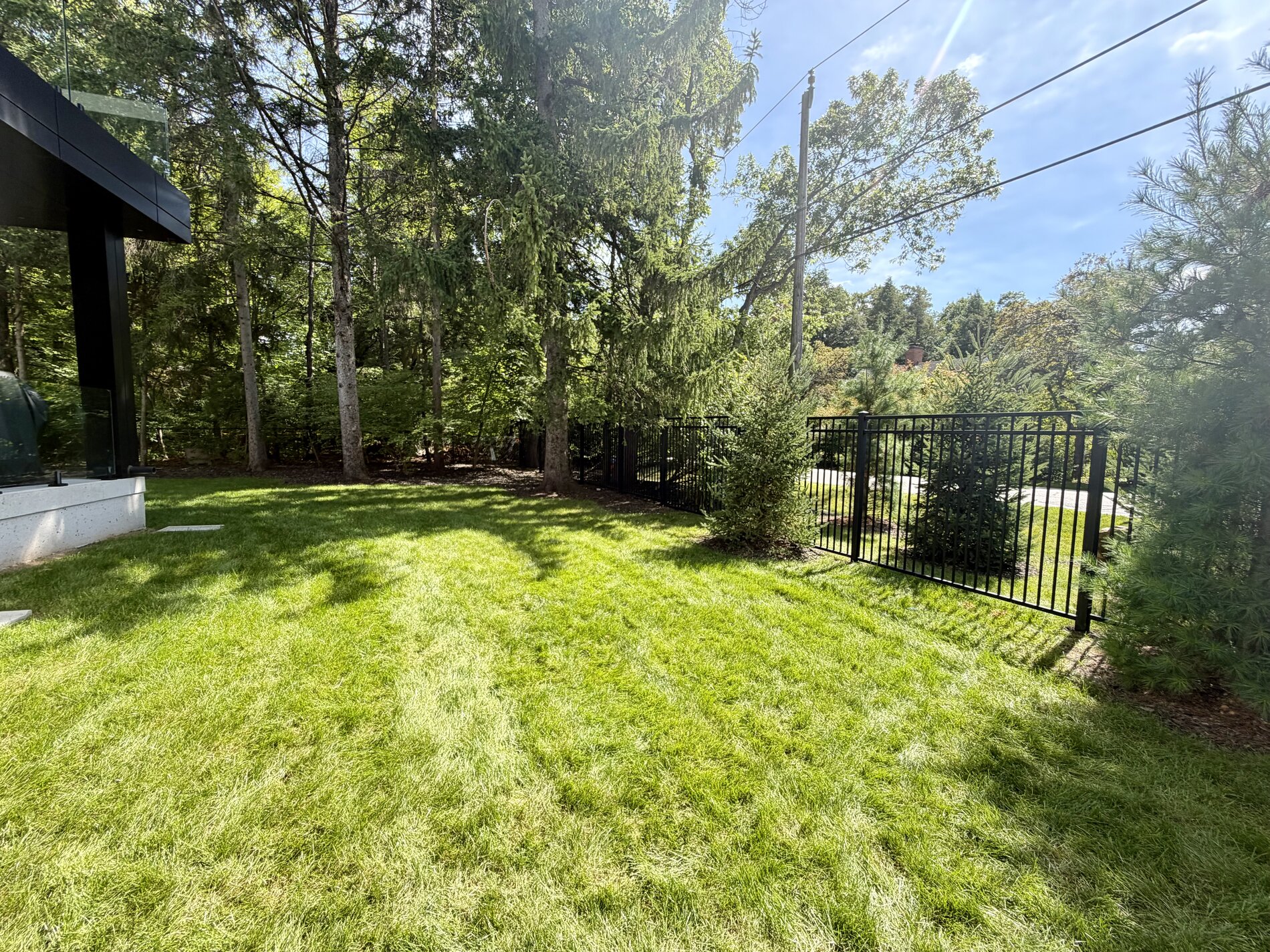 1654 Birchwood Drive — completed metal-fenced privacy yard
